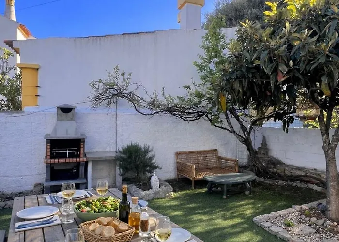 Фото Вилла Casa Acolhedora Com Jardim Privado E Bbq Сан-Браш-ди-Алпортел